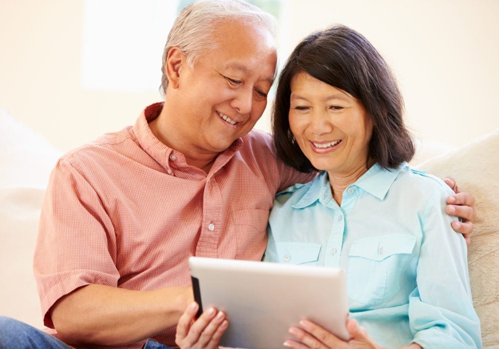 Couple Selling Real Estate Contracts