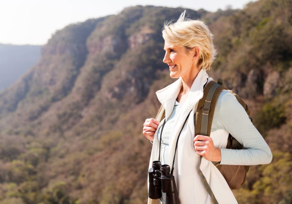 Woman happy after selling real estate contract